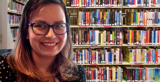 a librarian using a library photo as virtual background