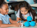 Young girls working on a science project