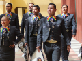 mariachi musicians with rainbow bowties