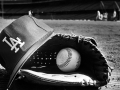 Close-up view of a Dodger player's hat, glove, and ball left on the field. Photograph dated January 11, 1989. Photo credit: James Ruebsamen, Herald Examiner Collection Close-up view of a Dodger player's hat, glove, and ball left on the field
