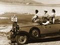 Tourists viewing Badwater in Death Valley from their car