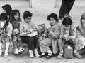 Children eating lunch b & w photo from 1983