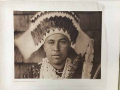Plate 455 Tolowa Dancing Head-Dress.  Native American Tolowa man wearing a head dress, photographed looking straight into camera with plain expression