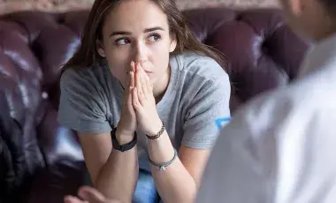 A woman deep in thought.