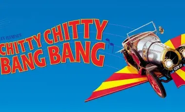 The picture has the title, Chitty Chitty Bang Bang, to the left and a flying car to the right