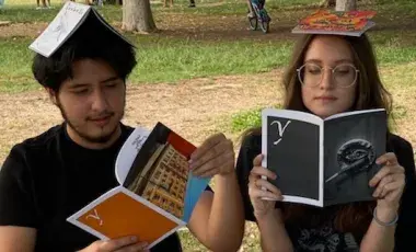 Two zine makers with several zines