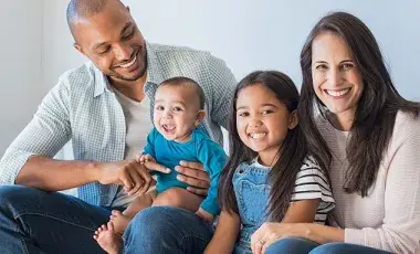 Mother and father with two children