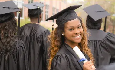 Young people at their college graduation. 