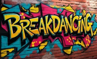 Breakdancing written in graffiti style against brick wall