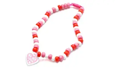 Necklace with white and pink pony beads with heart shape in the middle