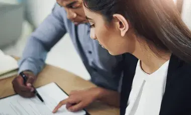 Couple looking at financial documents