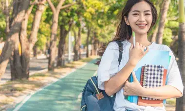 student walking on campus