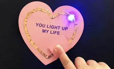 Circuit on top of a pink heart.