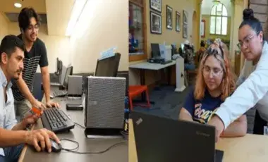 Four people using computers