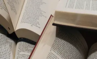 open books piled on top of each other