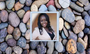 Image of Dr. Jacent Mpalyenkana instructor of the workshop. Image is over another image of smooth river stones.