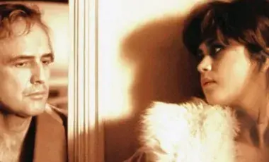 The protagonists Marlon Brando and Maria Schneider are in the picture