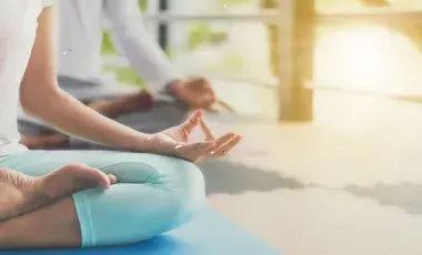 Two people are meditating