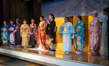 group of ladies in kimonos on a stage