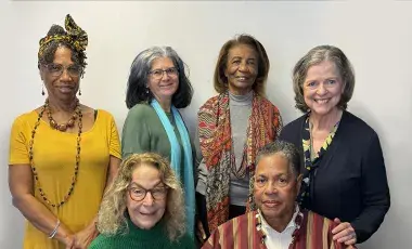 Group of women posing for photo.