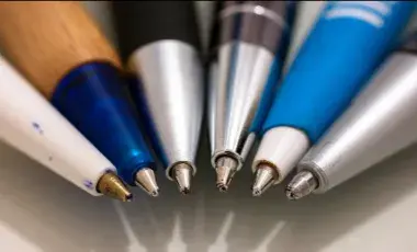 6 pens are arranged in a semi circle 