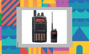 Small and large HAM radios sitting next to each other