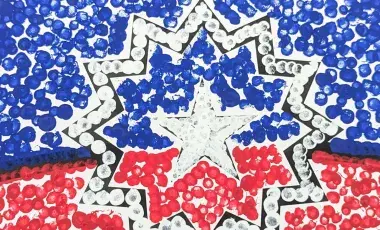 A pointillist painting of the Juneteenth flag.