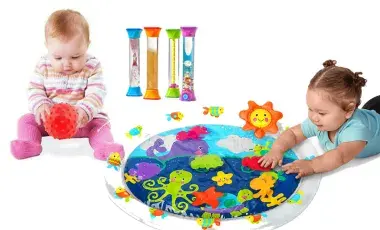 Two toddlers playing with sensory toys