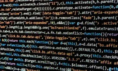 Multicolored code against a black background