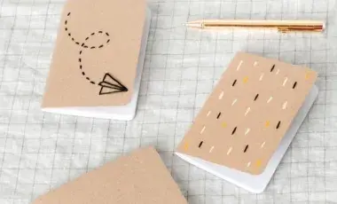 notebooks and a pen