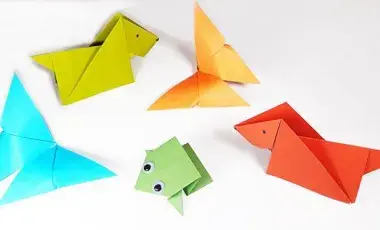 Colored paper that's been folded into various animals are on display.