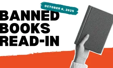A hand holding up a book with text: "Banned Books Read-In" next to it.
