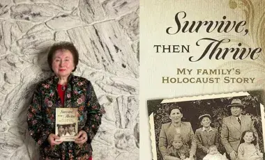 Author Clare Bursky holding her book