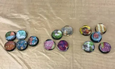 Colorful round magnets made using glass beads