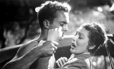 Wilma struggles to get away from Bill, her student who tries to rape her. 