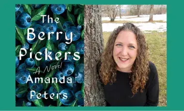 To the left is the cover of the Berry Pickers, featuring a close up picture of blueberries and leaves. To the right is a picture of Amanda Peters, photographed leaning next to a tree, with trees, snow, and grass in the background.