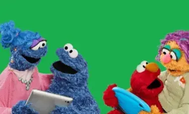 Cookie monster and his mother talking with a tablet in his hand, Emo and his mother talking with a tablet in his hand