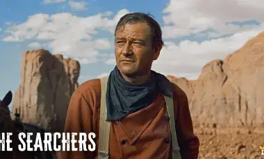 a man and his horse in the desert surrounded by mountains