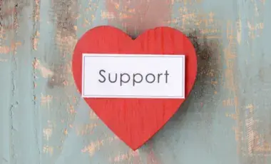 Heart on a background with a label saying "support"