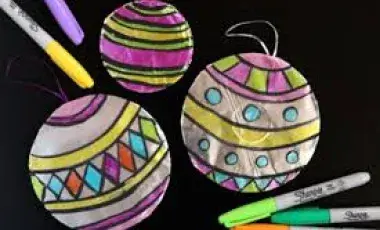 Three Tin Art ornaments. 