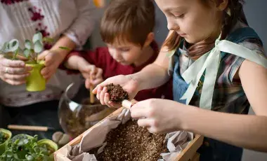 Children playing with dirt.