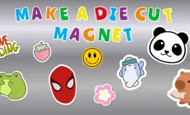 Colorful text reads "Make a Die Cut Magnet" with various playful magnets below: a frog, strawberry, smiley face, panda, superhero mask, flower, and a capybara reading