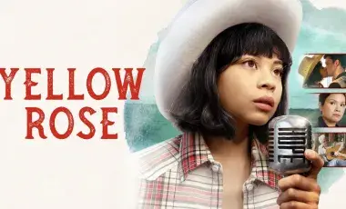 Woman wearing cowboy hat holding a microphone
