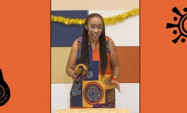 A woman with a gourd calabash hand drum.