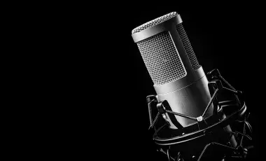 professional microphone against a black background
