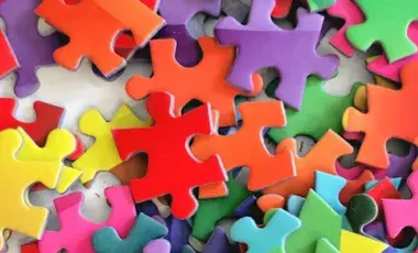 Image of puzzle pieces in vibrant colors