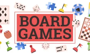 Image of board game materials and a sign that reads "board games"