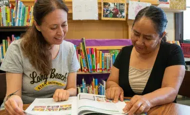 Adult Literacy tutor and learner having a session