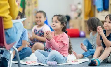 toddler sitting and listening at storytime