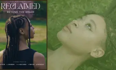 Black woman with braids looking to the right with green grass in the background.